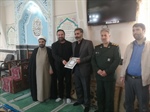 تجلیل از بسیجی عزیز میرزایی فرمانده گردان یکم امام علی(ع) بمناسبت هفته بسیج