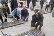 غبارروبی و گلباران مزار شهدای گرانقدر شهر باحضور فرماندار،  اعضای...
