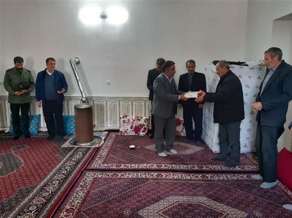دیدار با خانواده شهید رحمتی روستای رضا آباد در هفته بسیج