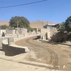 عملیات زیرسازی و جدول گذاری معابر روستای آقکند