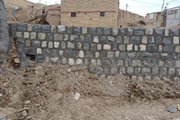 اجرای دیوار حفاظتی سنگی در روستای قلقاتی